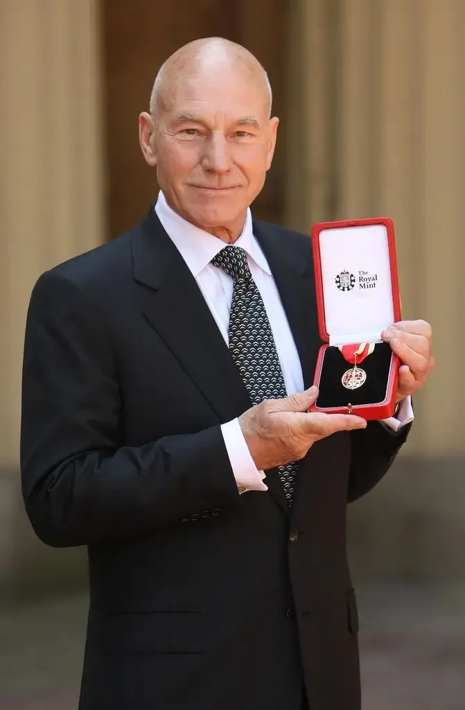 Sir Patrick Stewart poses with his award after he was Knighted by Britain's Queen Elizabeth II at Buckingham PalaceJune 02, 2010 in London, England. (Photo by Dominic Lipinski - WPA Pool/Getty Images)