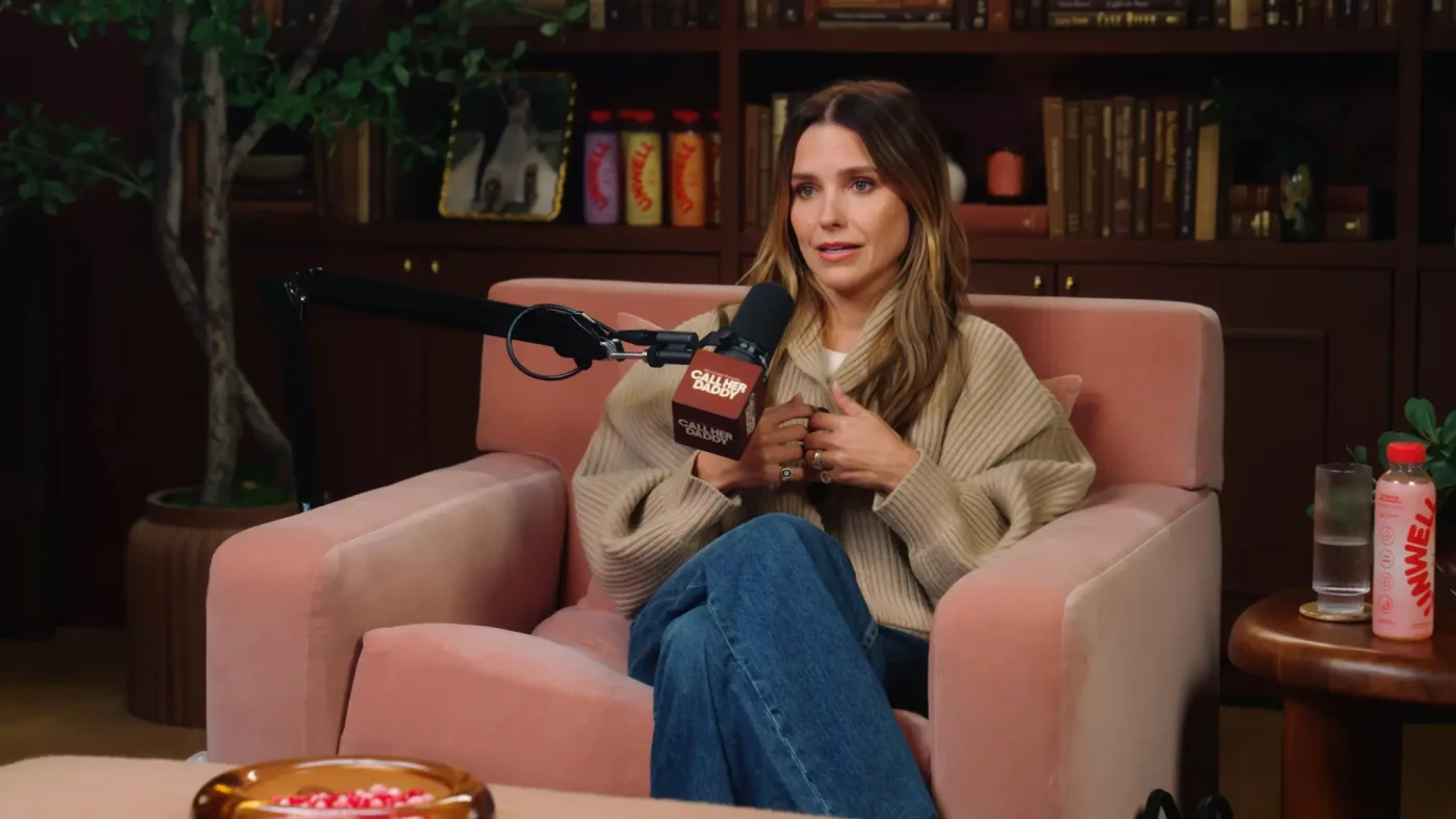 Sophia Bush seated in a pink armchair on the Call Her Daddy podcast.