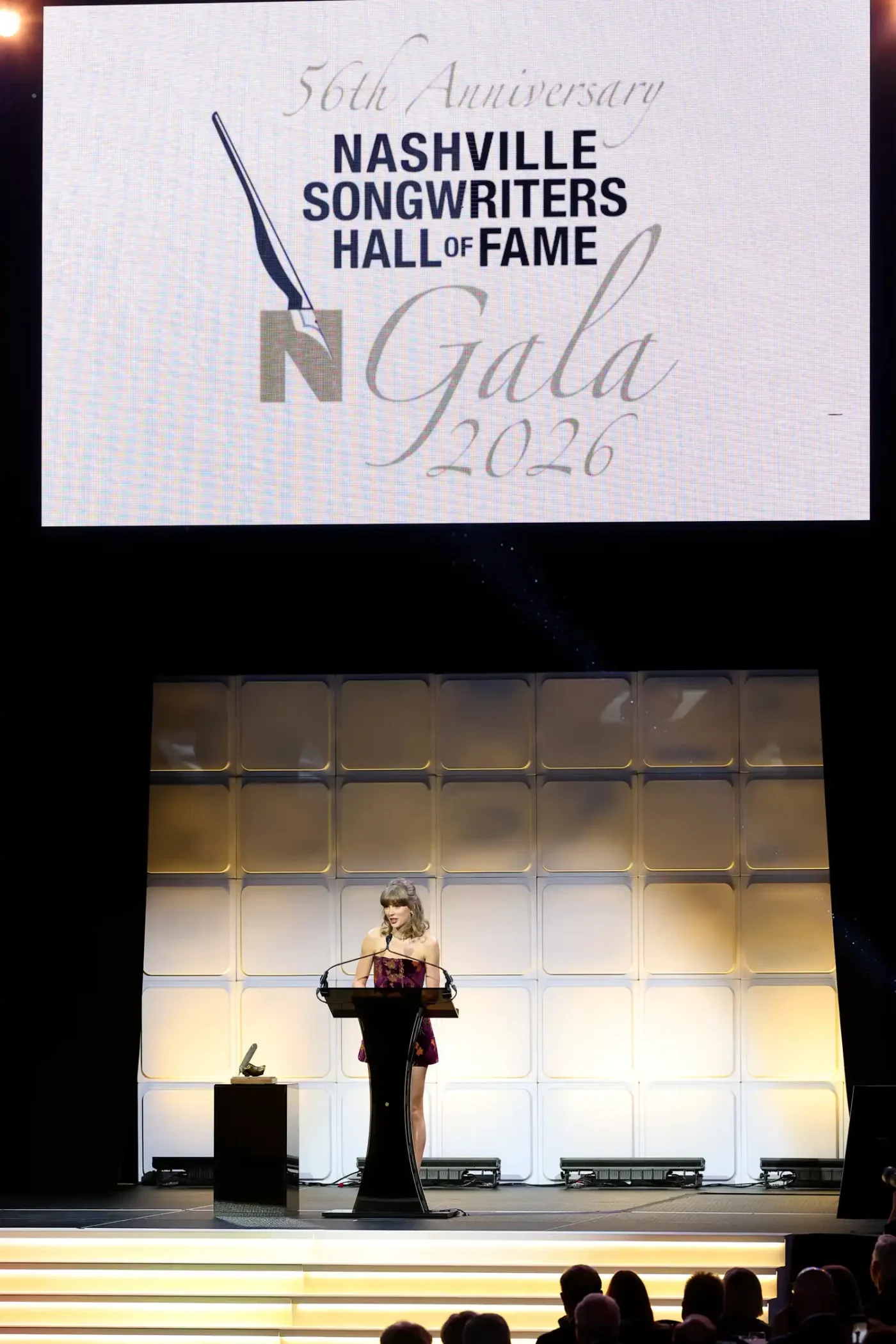 Taylor Swift accepting the honor on October 26, 2026.