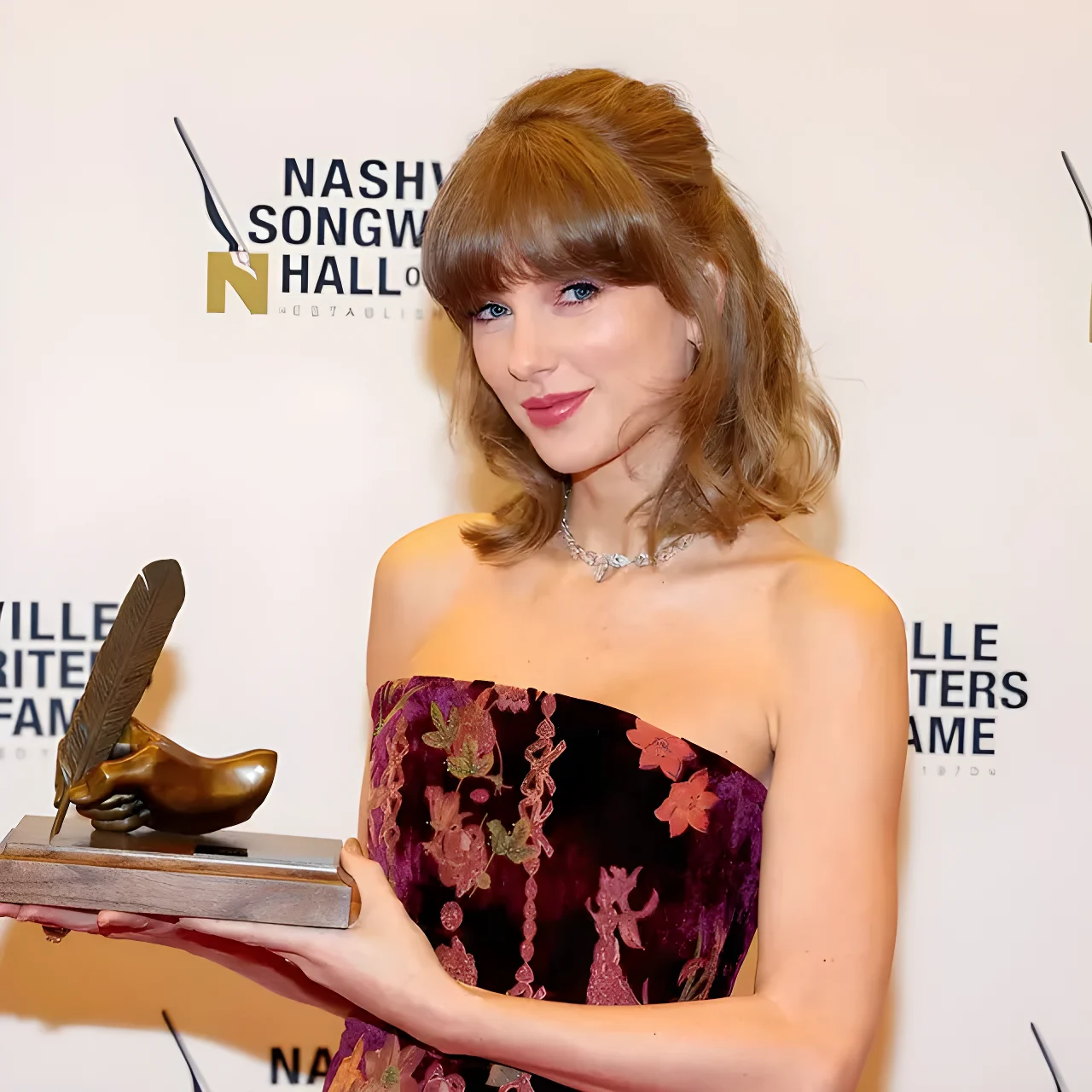 Taylor Swift stuns in velvet mini dress for history-making induction into Nashville Songwriters Hall of Fame
