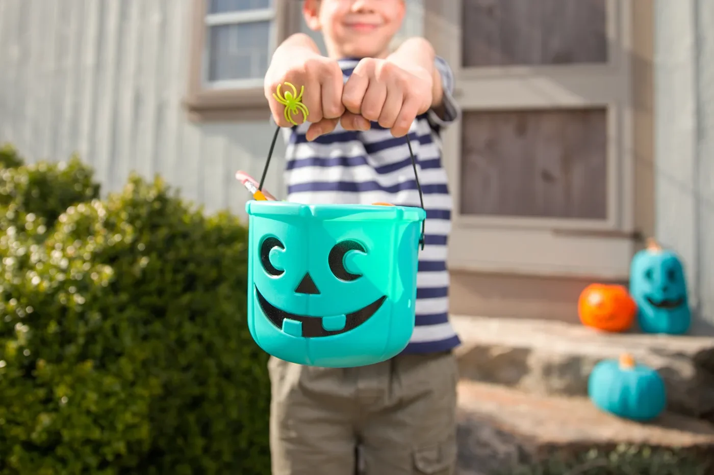 Teal Pumpkin Project. Alternative non-food treats for kids with food allergies. the concept of health for children in the Halloween season.