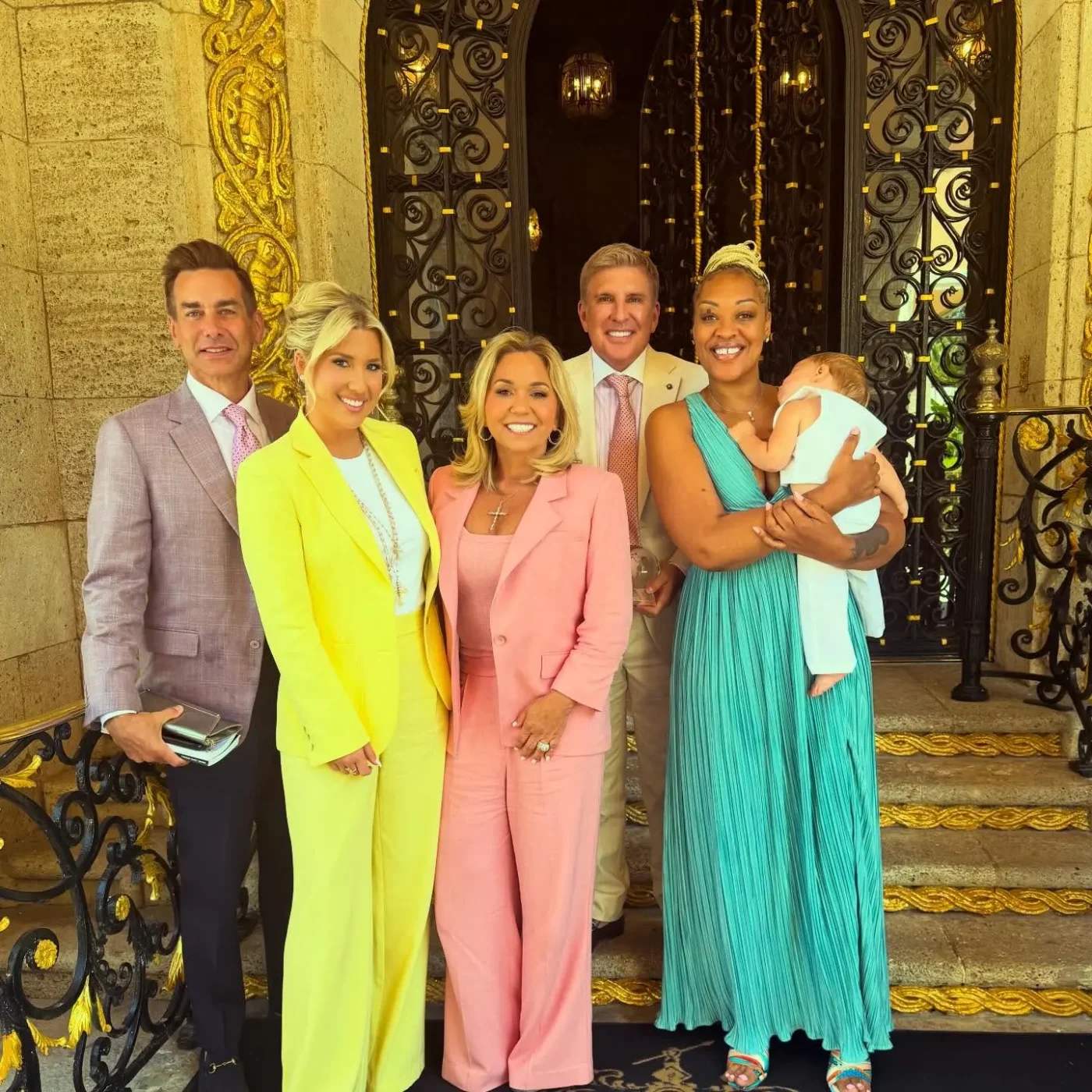 The Chrisley family posing with Savannah Chrisley