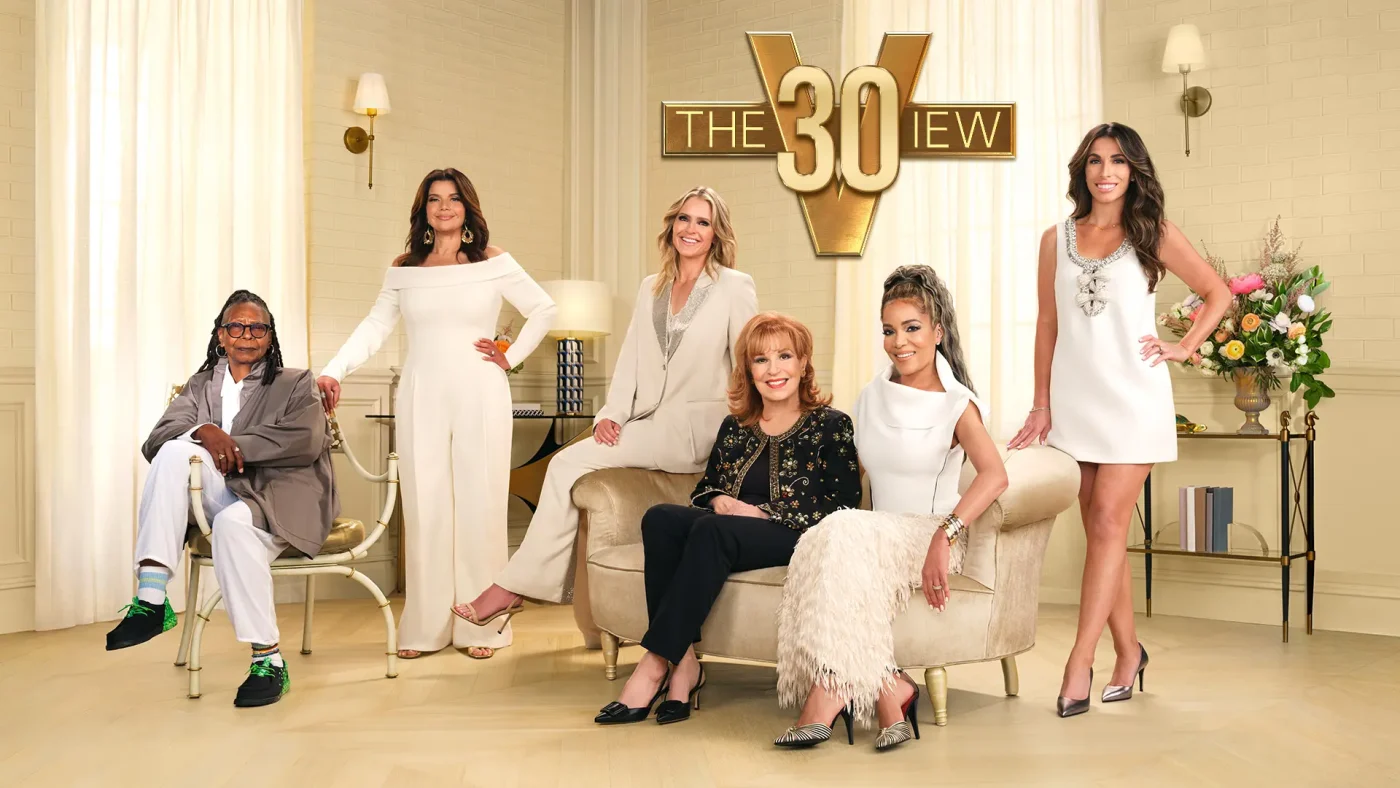 The co-hosts of The View season 30, Whoopi Goldberg, Ana Navarro, Sara Haines, Joy Behar, Sunny Hostin, and Alyssa Farah Griffin, pose together in a room.