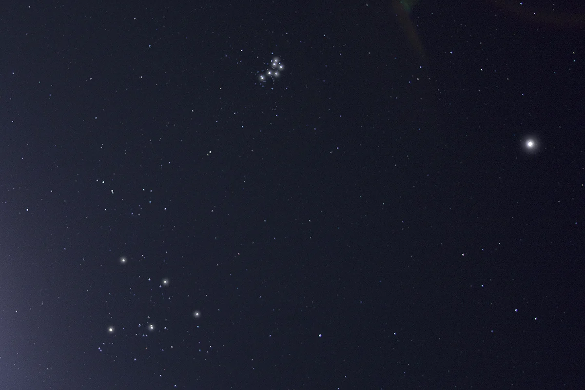 The Pleiades (top) and the Hyades star cluster (bottom left). Credit: Pete Lawrence