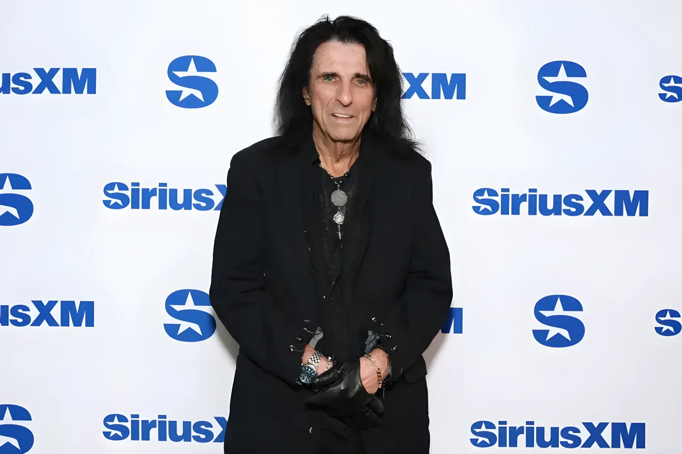 The singer is known for his long hair