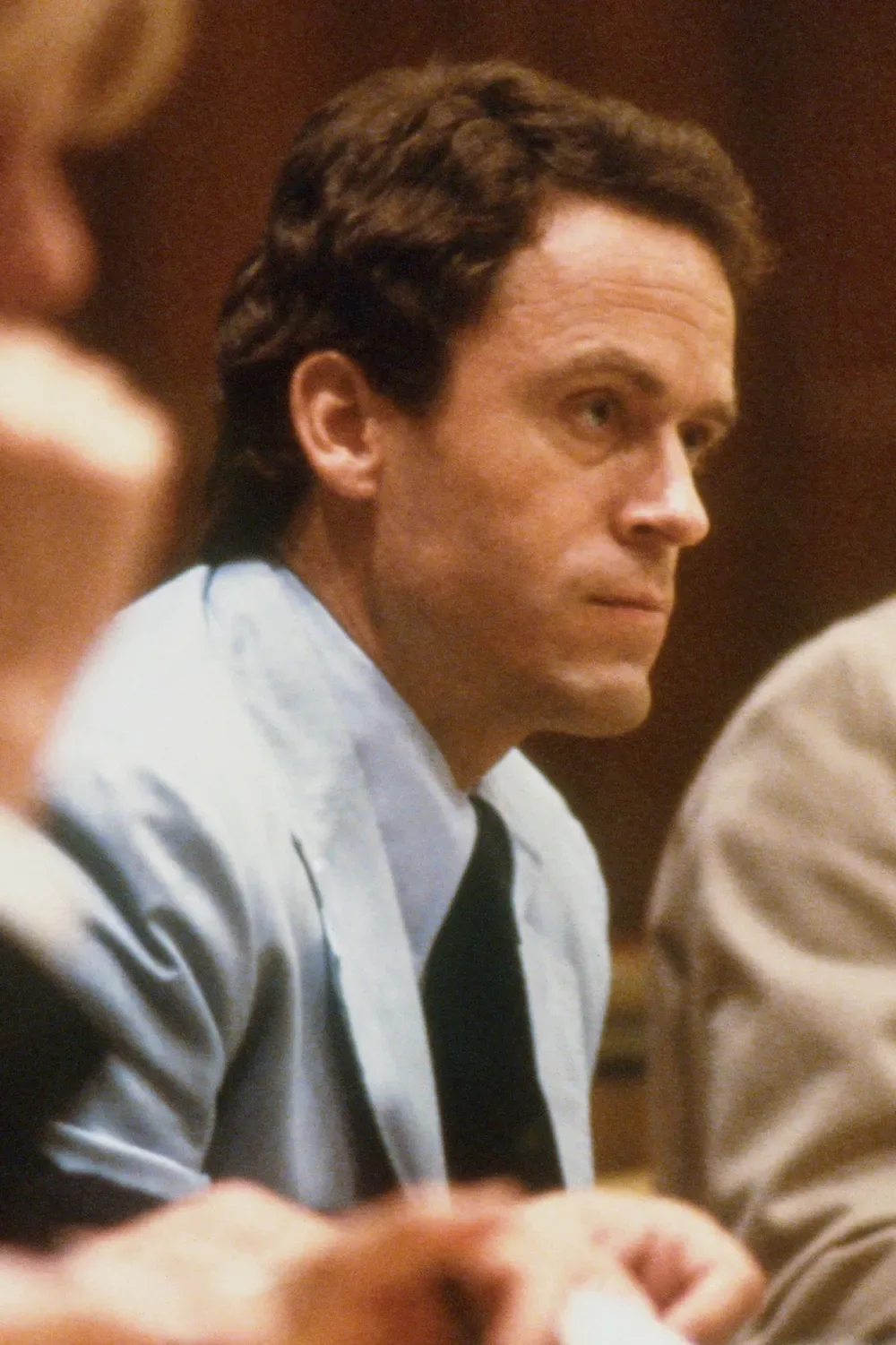 Theodore Bundy, seated in court, charged with the killings of two FSU coeds.