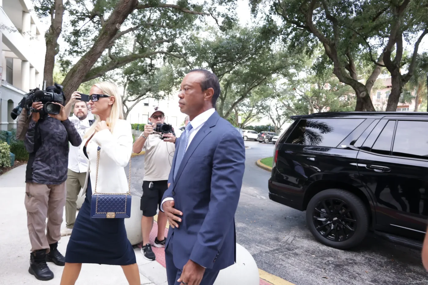 Tiger Woods arriving at court with Vanessa Trump.