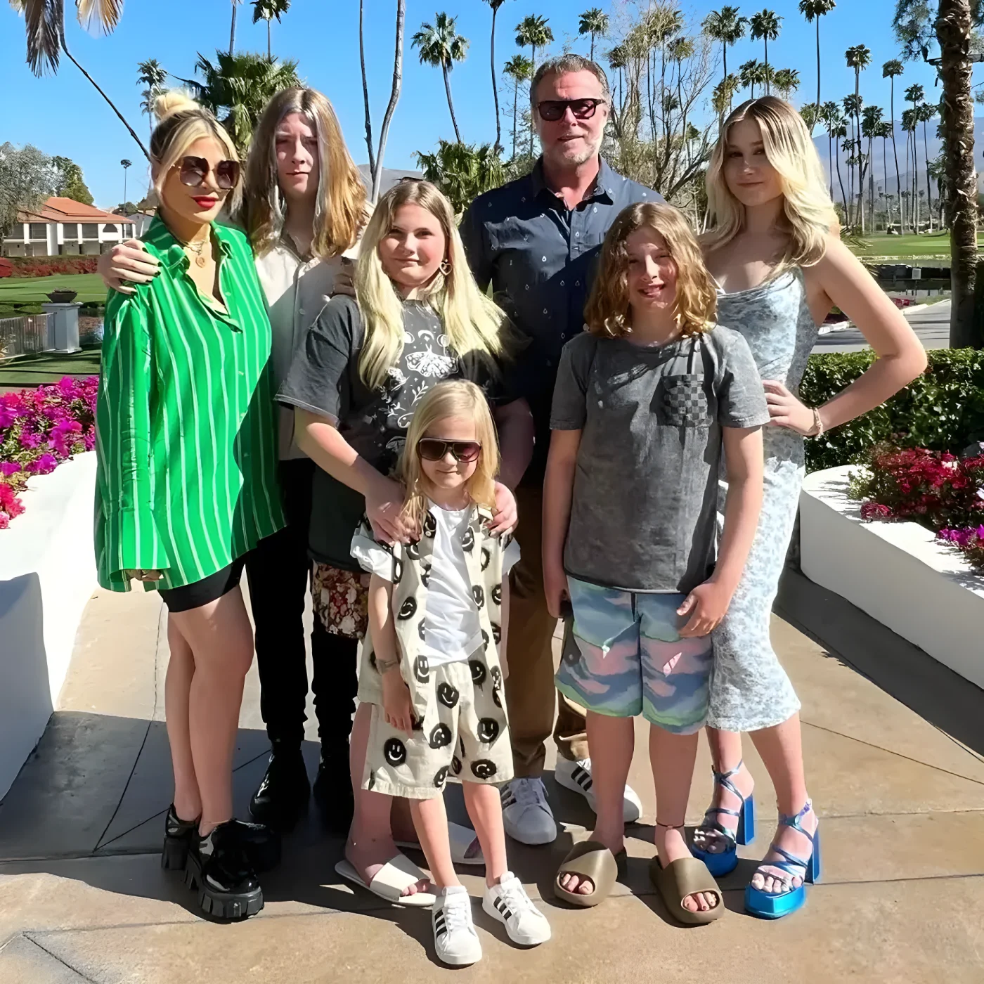Tori with her five children and estranged husband Dean