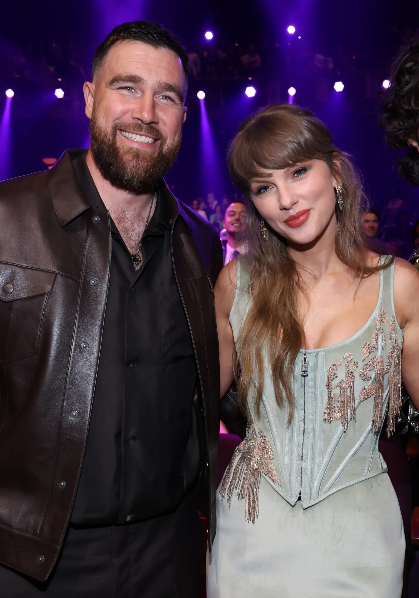 Travis Kelce and Taylor Swift attend an event together.
