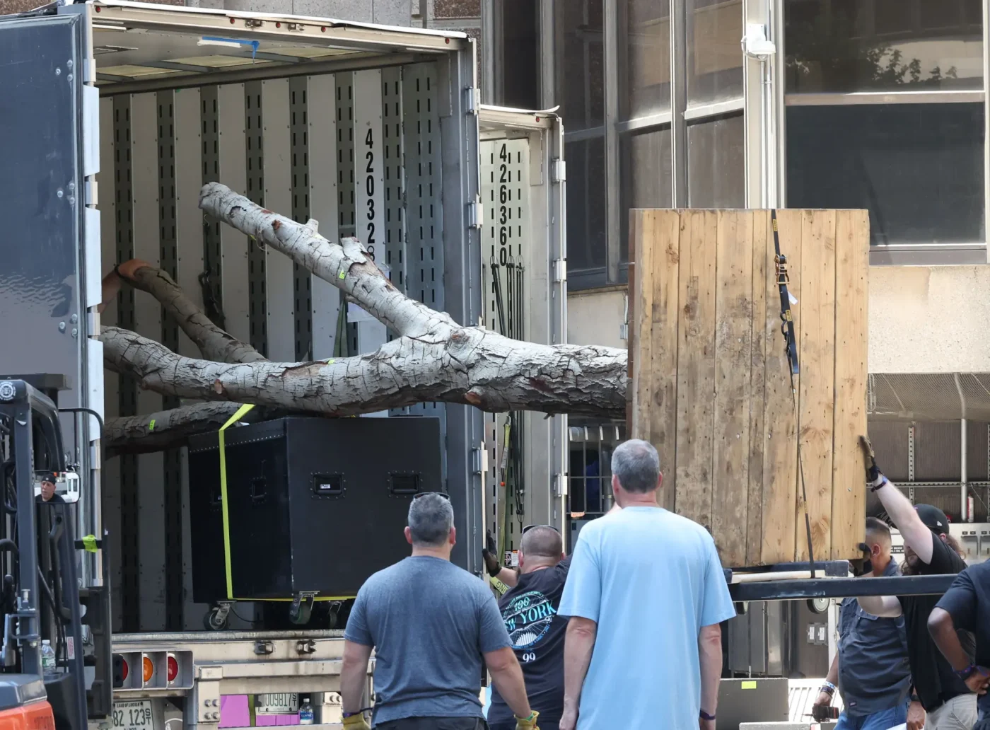 Trucks loading wedding equipment after Taylor Swift